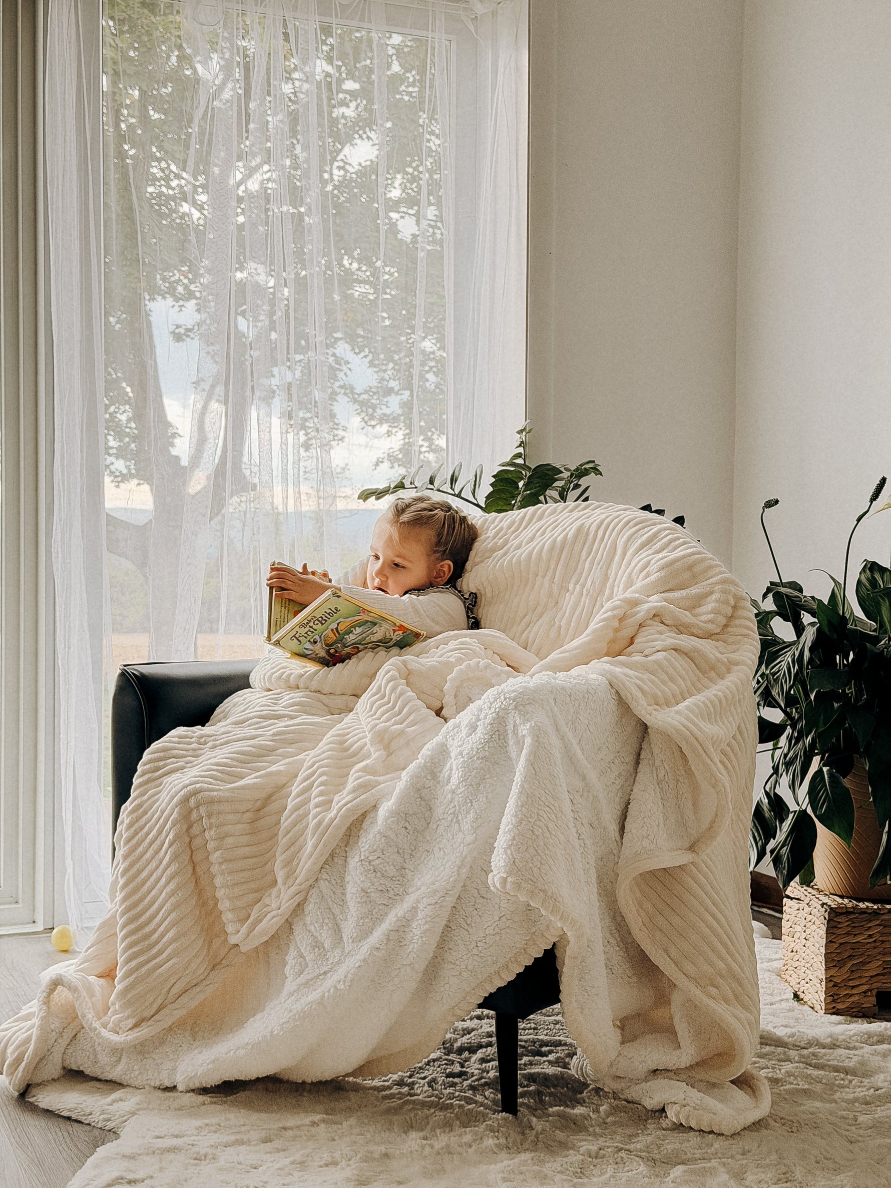 Homemate heated blanket providing comfort and warmth during reading time